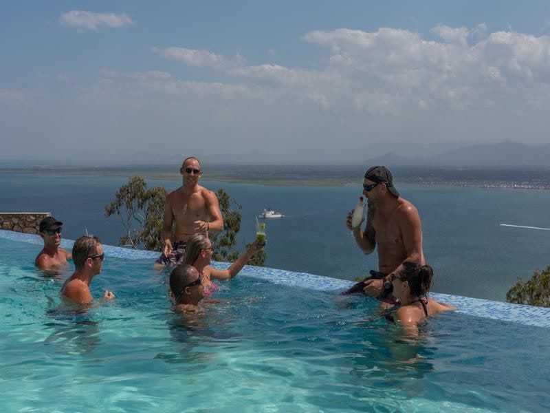 Guests relaxing in the infinity pool